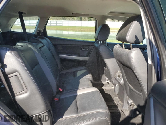 2012 Mazda CX-9 Grand Touring with VIN JM3TB3DV7C0350249, listed as a Copart auction lot 53088555 with 184,240 mi miles and Salvage Title. Bid and sale history available at carsss.com. Image 12.