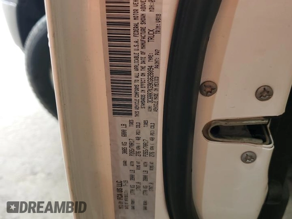 2019 Ram 1500 Tradesman with VIN 3C6RR7KG9KG628094, listed as a Copart auction lot 55074074 with 82,029 mi miles and Salvage title. Bid and sale history available at DreamBid. Image 14.
