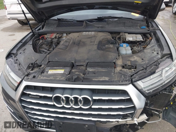 2017 Audi Q7 Premium Plus with VIN WA1LAAF70HD004911, listed as a IAAI auction lot 41910833 with 120,506 mi miles and . Bid and sale history available at DreamBid. Image 10.