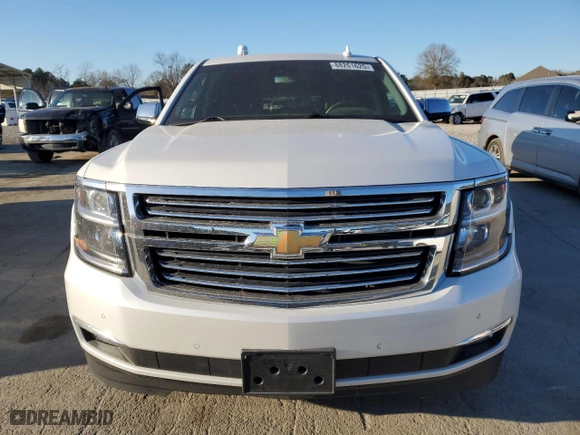 2017 Chevrolet Suburban Premier with VIN 1GNSCJKC5HR361378, listed as a Copart auction lot 88261625 with 68,992 mi miles and Salvage Title. Bid and sale history available at carsss.com. Image 5.