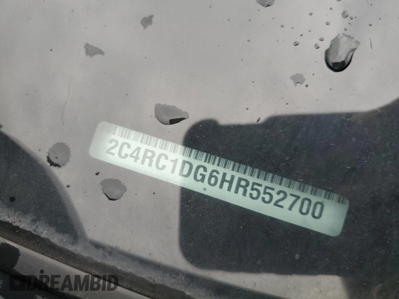 2017 Chrysler Pacifica Touring with VIN 2C4RC1DG6HR552700, listed as a Copart auction lot 61365895 with 128,407 mi miles and Salvage title. Bid and sale history available at DreamBid. Image 13.