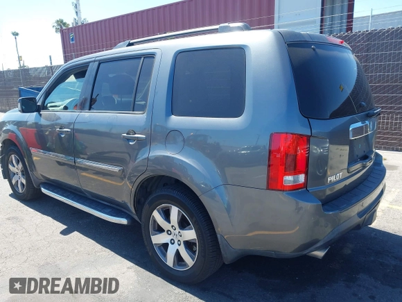 2013 Honda Pilot Touring with VIN 5FNYF3H94DB024069, listed as a IAAI auction lot 42638568 with 190,326 mi miles and . Bid and sale history available at DreamBid. Image 3.