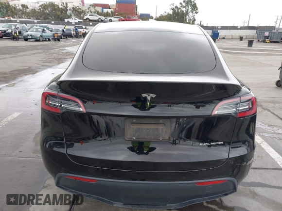 2022 Tesla Model Y Long Range z VIN 7SAYGDEE0NF508958, wystawiony jako IAAI lot #42191819 z przebiegiem 60 880 mil mil oraz . Historia ofert i sprzedaży dostępna na DreamBid. Obrazek 16.