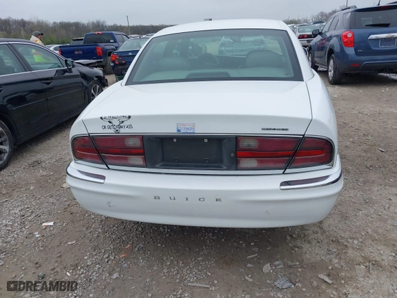 1999 Buick Park Avenue Ultra with VIN 1G4CU5217X4658627, listed as a IAAI auction lot 42013174 with 148,856 mi miles. Bid and sale history available at carsss.com. Image 16.