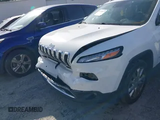2015 Jeep Cherokee Limited with VIN 1C4PJLDB9FW677367, listed as a IAAI auction lot 41826477 with 125,648 mi miles and . Bid and sale history available at DreamBid. Image 6.