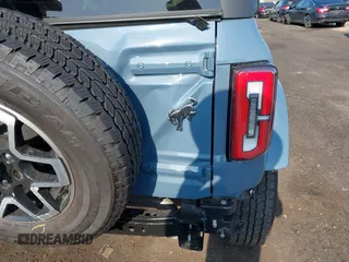2024 Ford Bronco Outer Banks z VIN 1FMDE8BH3RLB41205, wystawiony jako IAAI lot #42558633 z przebiegiem 1 457 mil mil oraz . Historia ofert i sprzedaży dostępna na DreamBid. Obrazek 6.