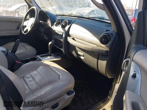 2004 Jeep Liberty Limited with VIN 1J8GL58K34W214825, listed as a IAAI auction lot 41456625 with 210,346 mi miles. Bid and sale history available at carsss.com. Image 5.