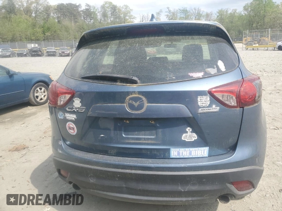2015 Mazda CX-5 Sport with VIN JM3KE2BE9F0462541, listed as a Copart auction lot 54197105 with 236,682 mi miles and Clean Title. Bid and sale history available at carsss.com. Image 6.