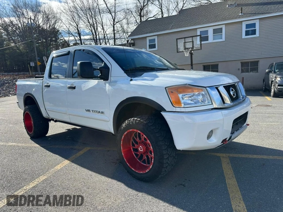 2015 Nissan Titan SL with VIN 1N6BA0EC7FN509763, listed as a Copart auction lot 88064785 with 168,916 mi miles and Clean Title. Bid and sale history available at carsss.com. Image 4.