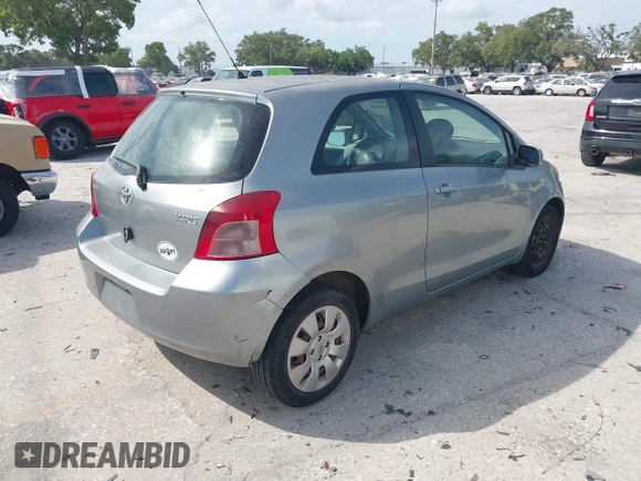2008 Toyota Yaris with VIN JTDJT923185180160, listed as a IAAI auction lot 42169896 with 340,931 mi miles. Bid and sale history available at carsss.com. Image 4.