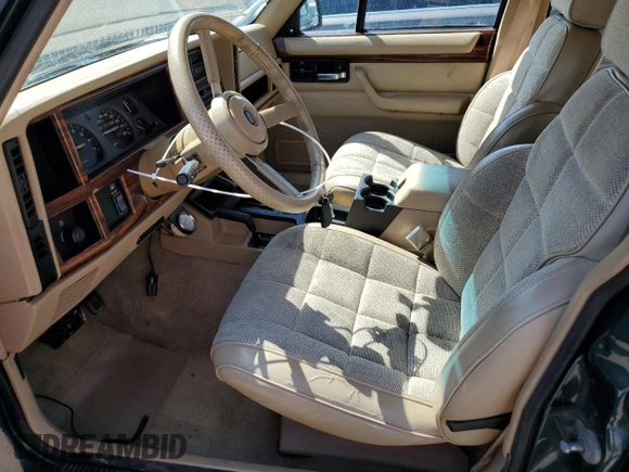 1993 Jeep Cherokee Country with VIN 1J4FJ78S4PL517648, listed as a Copart auction lot 72383564 with 127,156 mi miles and Salvage Title. Bid and sale history available at carsss.com. Image 7.