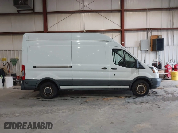 2017 Ford Transit z VIN 1FTYR2XM2HKA66479, wystawiony jako IAAI lot #41371992 z przebiegiem 122 534 mil mil oraz . Historia ofert i sprzedaży dostępna na DreamBid. Obrazek 13.