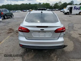 2017 Ford Focus SE with VIN 1FADP3F29HL242325, listed as a Copart auction lot 61153555 with 136,666 mi miles and Salvage title. Bid and sale history available at DreamBid. Image 6.