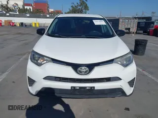 2017 Toyota RAV4 LE with VIN JTMZFREV8HJ145159, listed as a IAAI auction lot 42078884 with 103,425 mi miles and . Bid and sale history available at carsss.com. Image 13.