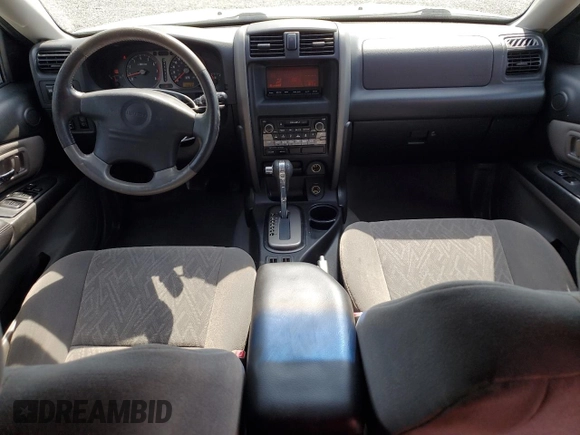 2003 Isuzu Axiom с VIN 4S2CE58X434600986, выставлен на аукционе Copart как лот 58079755 с пробегом 75 634 миль миль и Списание • Salvage title. История ставок и продаж доступна на DreamBid. Изображение 8.