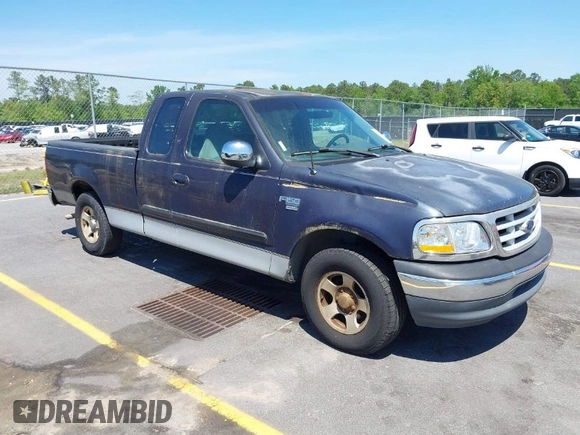 1999 Ford F-150 with VIN 1FTRX17W9XNB32397, listed as a IAAI auction lot 42048746 with 290,179 mi miles and . Bid and sale history available at DreamBid. Image 1.