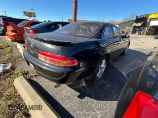 1995 Lexus SC 400 z VIN JT8UZ30CXS0041496, wystawiony jako Copart lot #80837114 z przebiegiem 62 010 mil mil oraz Tytuł czysty. Historia ofert i sprzedaży dostępna na DreamBid. Obrazek 4.