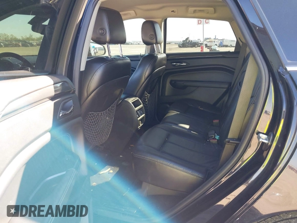 2015 Cadillac SRX with VIN 3GYFNAE30FS573125, listed as a IAAI auction lot 40972187 with 122,612 mi miles and . Bid and sale history available at DreamBid. Image 8.
