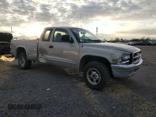 1999 Dodge Dakota SLT with VIN 1B7GG22Y3XS275370, listed as a Copart auction lot 81568994 with 241,945 mi miles and Salvage Title. Bid and sale history available at DreamBid. Image 4.