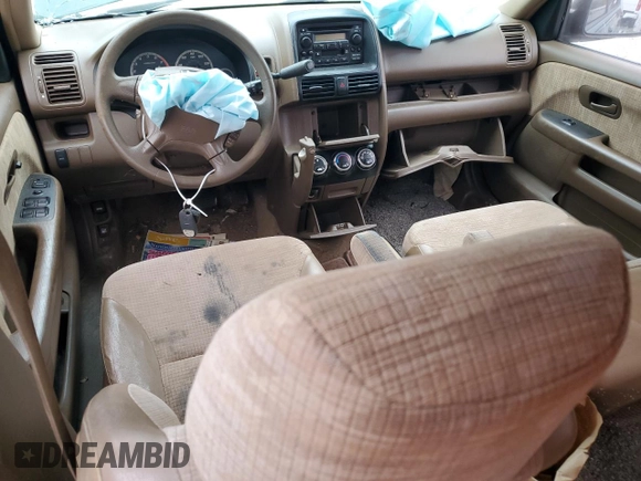 2002 Honda CR-V LX z VIN JHLRD785X2C083218, wystawiony jako Copart lot #73082804 z przebiegiem Nie podano mil oraz Szkoda całkowita • Salvage title. Historia ofert i sprzedaży dostępna na DreamBid. Obrazek 8.