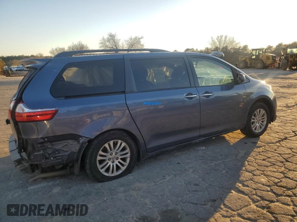 2016 Toyota Sienna XLE с VIN 5TDYK3DC6GS691111, выставлен на аукционе Copart как лот 87195014 с пробегом 196 691 миль миль и Списание • Salvage title. История ставок и продаж доступна на DreamBid. Изображение 3.