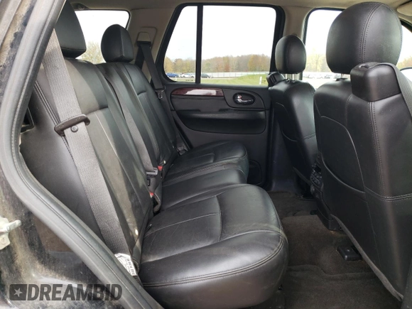 2007 GMC Envoy SLT with VIN 1GKDT13S972197393, listed as a Copart auction lot 77958764 with 151,586 mi miles and Salvage Title. Bid and sale history available at DreamBid. Image 11.