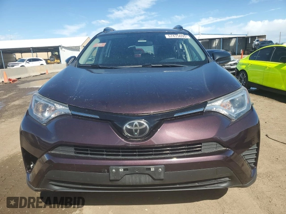 2018 Toyota RAV4 LE with VIN 2T3BFREV6JW739046, listed as a Copart auction lot 57475695 with 81,410 mi miles and Salvage title. Bid and sale history available at DreamBid. Image 5.