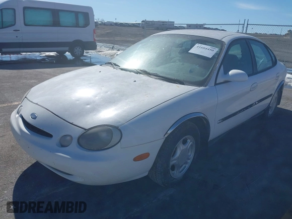 1996 Ford Taurus GL z VIN 1FALP52U0TG128147, wystawiony jako IAAI lot #41604450 z przebiegiem 152 949 mil mil oraz . Historia ofert i sprzedaży dostępna na DreamBid. Obrazek 2.