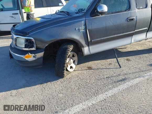2002 Ford F-150 XL with VIN 1FTRX17L52NA85965, listed as a IAAI auction lot 41796633 with 171,814 mi miles. Bid and sale history available at carsss.com. Image 12.