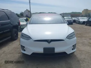 2016 Tesla Model X 70D with VIN 5YJXCBE24GF002020, listed as a IAAI auction lot 41799528 with 149,556 mi miles. Bid and sale history available at carsss.com. Image 12.