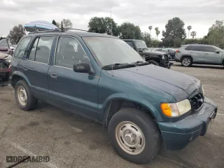 2001 Kia Sportage with VIN KNDJB723615696057, listed as a Copart auction lot 53584345 with 107,965 mi miles and Clean Title. Bid and sale history available at carsss.com. Image 4.