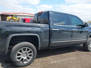 2014 GMC Sierra 1500 Denali z VIN 3GTU2WEC6EG401458, wystawiony jako IAAI lot #41935704 z przebiegiem 149 136 mil mil oraz . Historia ofert i sprzedaży dostępna na DreamBid. Obrazek 14.