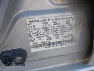 1999 Nissan Altima XE with VIN 1N4DL01D4XC252973, listed as a IAAI auction lot 42005504 with 247,570 mi miles. Bid and sale history available at carsss.com. Image 9.