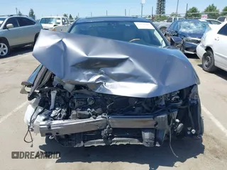 2013 Lexus ES 300h with VIN JTHBW1GG5D2028515, listed as a IAAI auction lot 42374768 with 107,737 mi miles and . Bid and sale history available at DreamBid. Image 13.