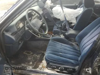 1989 Toyota Camry z VIN 4T1SV22E0KU032677, wystawiony jako Copart lot #46308555 z przebiegiem 993 896 mil mil oraz Czysty tytuł • Clean title. Historia ofert i sprzedaży dostępna na DreamBid. Obrazek 7.