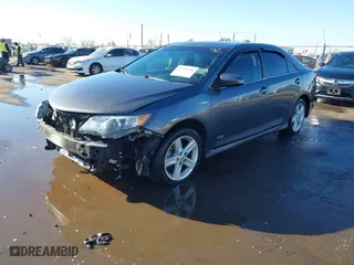 2014 Toyota Camry Hybrid LE with VIN 4T1BD1FK8EU135234, listed as a IAAI auction lot 41399246 with 104,964 mi miles. Bid and sale history available at carsss.com. Image 18.