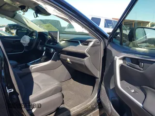 2023 Toyota RAV4 Hybrid LE with VIN JTMMWRFV2PD194525, listed as a IAAI auction lot 41706111 with 53,128 mi miles. Bid and sale history available at carsss.com. Image 5.