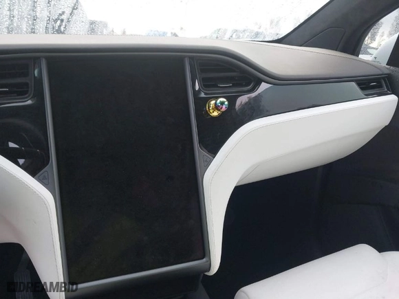 2018 Tesla Model X 75D with VIN 5YJXCBE2XJF102341, listed as a IAAI auction lot 41731511 with NaN miles. Bid and sale history available at carsss.com. Image 18.