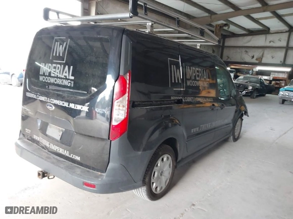 2015 Ford Transit Connect XL with VIN NM0LE7E73F1179583, listed as a IAAI auction lot 40760047 with 145,463 mi miles. Bid and sale history available at carsss.com. Image 4.