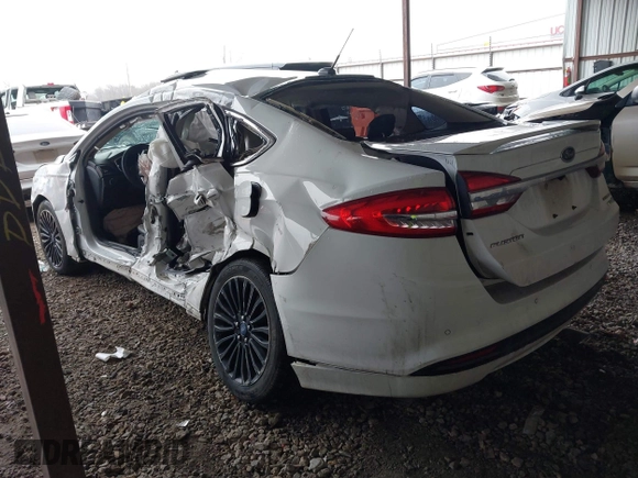 2017 Ford Fusion Hybrid Titanium with VIN 3FA6P0RU1HR322997, listed as a IAAI auction lot 41506630 with 263,589 mi miles and . Bid and sale history available at DreamBid. Image 3.