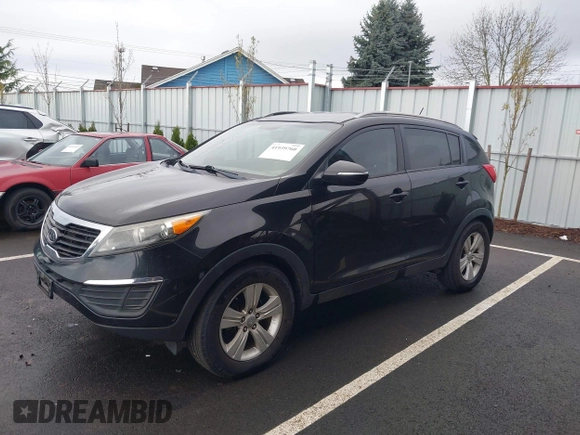 2011 Kia Sportage LX with VIN KNDPB3A26B7100916, listed as a IAAI auction lot 41939760 with 205,890 mi miles and . Bid and sale history available at carsss.com. Image 2.