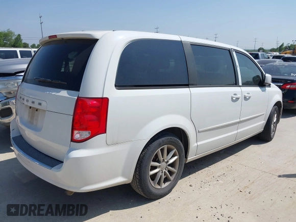 2015 Dodge Grand Caravan SE with VIN 2C4RDGBG9FR691462, listed as a IAAI auction lot 42197050 with 124,239 mi miles and . Bid and sale history available at DreamBid. Image 4.