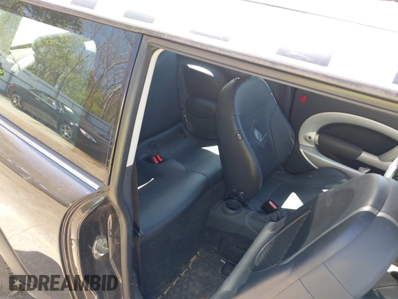 2003 MINI Hardtop with VIN WMWRC33463TC41773, listed as a IAAI auction lot 42223276 with 115,127 mi miles and . Bid and sale history available at DreamBid. Image 8.