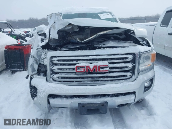 2015 GMC Canyon 4WD SLT with VIN 1GTG6CE36F1257975, listed as a IAAI auction lot 41607688 with 127,523 mi miles. Bid and sale history available at carsss.com. Image 12.