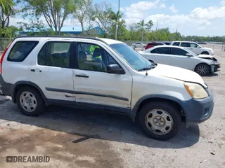 2005 Honda CR-V LX with VIN JHLRD68565C005484, listed as a IAAI auction lot 41983513 with 215,839 mi miles. Bid and sale history available at carsss.com. Image 12.