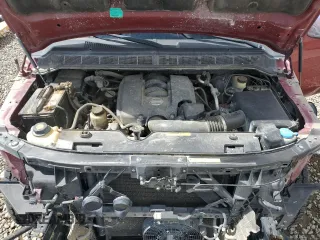 2005 Nissan Titan LE z VIN 1N6AA07B85N556721, wystawiony jako Copart lot #56566275 z przebiegiem 161 847 mil mil oraz Szkoda całkowita • Salvage title. Historia ofert i sprzedaży dostępna na DreamBid. Obrazek 11.