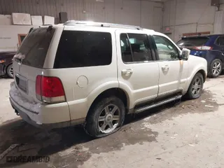 2004 Lincoln Aviator Luxury with VIN 5LMEU88H04ZJ31510, listed as a IAAI auction lot 41599571 with 118,956 mi miles. Bid and sale history available at carsss.com. Image 4.
