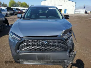 2022 Toyota Corolla Cross LE with VIN 7MUCAABGXNV025847, listed as a Copart auction lot 49153095 with 37,789 mi miles and Salvage title. Bid and sale history available at DreamBid. Image 5.