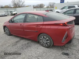 2022 Toyota Prius LE z VIN JTDKAMFP5N3213162, wystawiony jako Copart lot #82551774 z przebiegiem 55 173 mil mil oraz Szkoda całkowita • Salvage title. Historia ofert i sprzedaży dostępna na DreamBid. Obrazek 2.