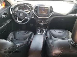 2016 Jeep Cherokee Trailhawk with VIN 1C4PJMBS3GW102000, listed as a Copart auction lot 60866505 with 120,985 mi miles and Salvage title. Bid and sale history available at DreamBid. Image 8.